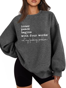 Detail of grey fleece sweatshirt with drop shoulder design and white slogan print