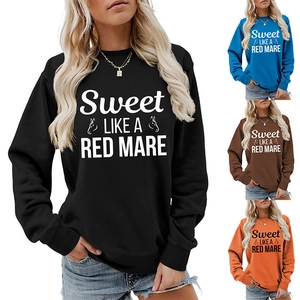 Detail view of round neck long sleeve sweatshirt with horse graphic in four color options