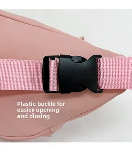 Detail of durable black plastic buckle and pink woven strap for easy opening and closing