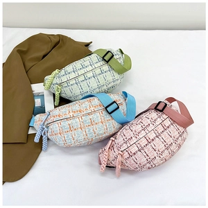 Plaid canvas saddle crossbody bag with adjustable nylon strap in three vibrant colors