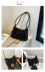 Détail du sac bandoulière à paillettes noires avec texture brillante et anse