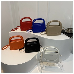 Minimalist matte leather handbags in six elegant colors with fashion text and top handles