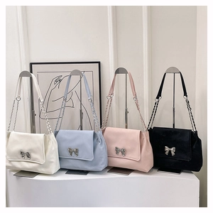 Minimalist soft PU leather shoulder bag with metallic bow in four versatile colors