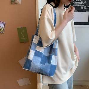 Retro patchwork denim tote bag with blue checkered canvas squares for casual shoulder wear