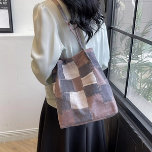 Retro patchwork canvas tote bag with brown and beige checkered patterns for casual use