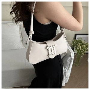Cream white leather underarm bag with silver gothic H buckle and knot strap detail