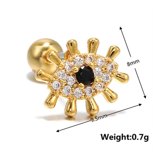 Detail view of gold Evil Eye cartilage earring with white zircons and screw ball back
