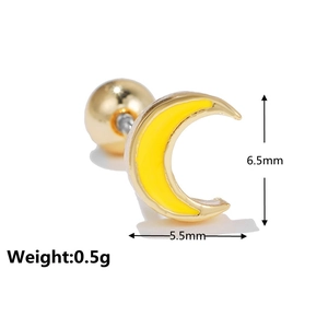 Macro view of gold moon stud earring with yellow enamel and screw back ball closure