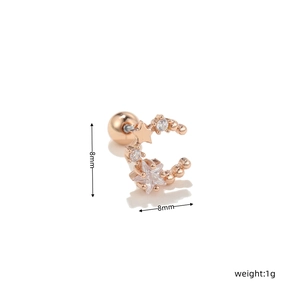 Close-up of 8mm rose gold crescent moon stud earring with star details and inset crystals