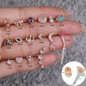 Pendientes de acero inoxidable oro rosa con pequeños circonios en varias formas