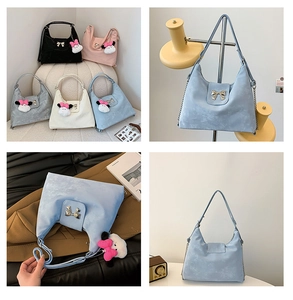 Detail of marble texture synthetic leather bags with metal bow and cute doll charm