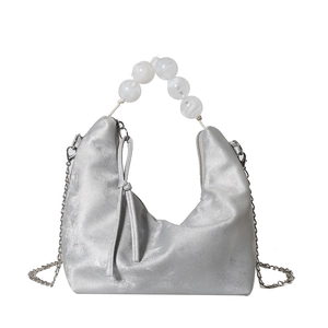 Silver metallic semi-circle handbag with beaded handle and chain strap for women