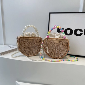 Handmade semi-circle rattan handbags with pearl chains and drawstring liners