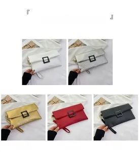 Litchi pattern envelope clutch bags in five colors with wristlets and buckle details