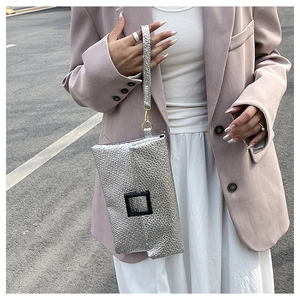 Silver envelope clutch bag with lychee texture and metallic square buckle detail