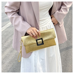 Elegant gold lychee texture envelope clutch bag with black buckle and wrist strap