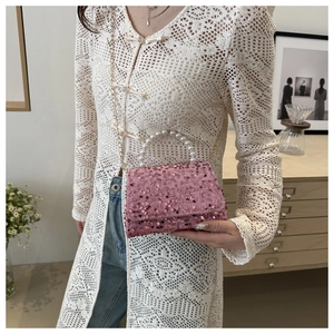Pink sequined mini bag detail with pearl handle and golden chain strap for women