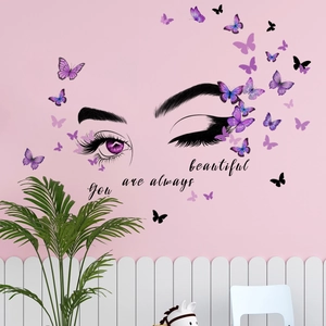 Detail of female eye wall sticker with purple butterflies and inspirational quote