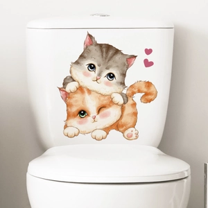 Watercolor cat toilet sticker featuring cute orange and grey kittens on a white tank