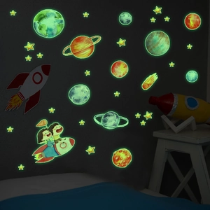 Luminous space wall stickers with planet and rocket patterns for glow in the dark kids rooms