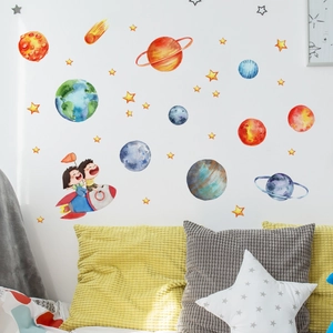 Space theme wall stickers featuring planets and watercolor cartoon astronauts in kid's room
