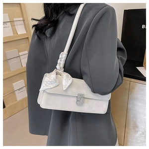 Elegant white crossbody square bag with silk ribbon handle and crystal buckle decoration