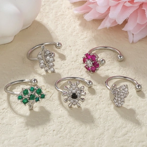 Minimalist zircon ear cuffs set featuring leaf, flower, and butterfly designs in silver