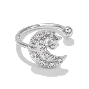 Detailed macro view of moon and star ear cuff with sparkling zircon inlay design