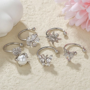 Detail of 5-piece silver ear cuff set with micro-set zircon and butterfly design