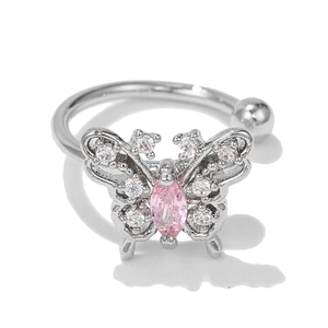 Macro shot of 18k butterfly ear cuff with micro-pave crystals and pink marquise stone