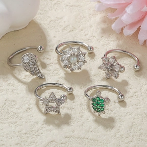 Five-piece silver sparkling rhinestone ear cuff set with flower and wing designs