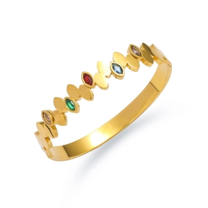 Gouden roestvrijstalen armband met gegolfde randen en kleurrijke edelstenen