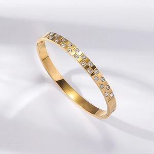 Elegant gold-plated open bangle featuring double rows of inlaid white zircon stones