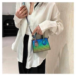 Mini iridescent quilted handbag with gradient holographic finish and crossbody strap