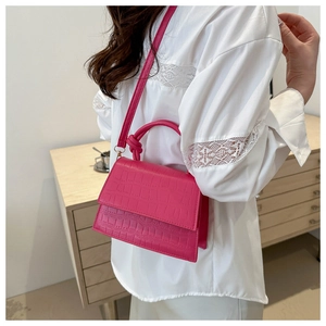Elegant rose red crocodile embossed crossbody handbag with knot handle and square flap design
