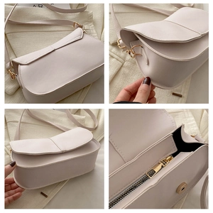Dettagli della borsa a tracolla in pelle beige con finiture dorate e cerniera interna