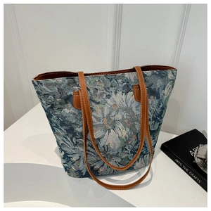 Borsa tote in tessuto jacquard vintage con motivi floreali e manici in pelle marrone