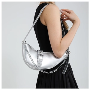 Metallic silver crescent shoulder bag with chunky chain strap for modern women