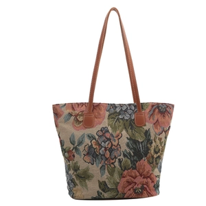 Vintage floral jacquard tote bag with brown leather straps and spacious trapeze shape