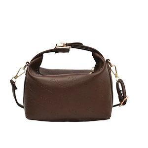 Dark brown embossed cloud pillow bag with rich rabbit pattern and gold hardware strap