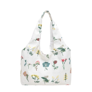 Floral print canvas hobo bucket bag with colorful flower embroidery in white fabric
