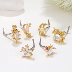 Set de 6 piercings de nariz dorados con diseños florales y animales, ópalo y circonita