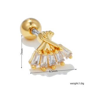 Detail view of gold fan-shaped stud earring with zircon inlay and screw ball back