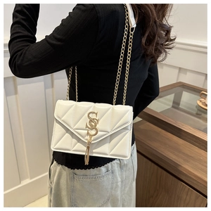 Quilted white chain crossbody bag for women with elegant golden tassel and S-logo buckle