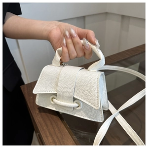 White lychee leather mini handbag with knot handle and detachable shoulder strap