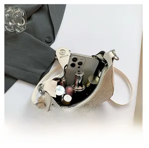 Top view showing the spacious interior capacity of the rhinestone crossbody handbag