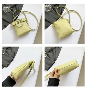 Detailed views of light green bow shoulder bag with pearl handle and leather texture