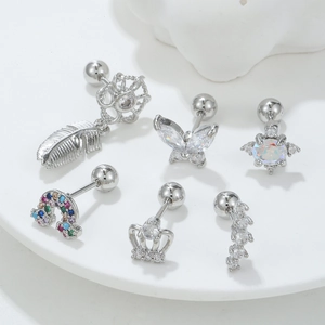 Set of 6 silver stainless steel cartilage earrings featuring feather and butterfly designs