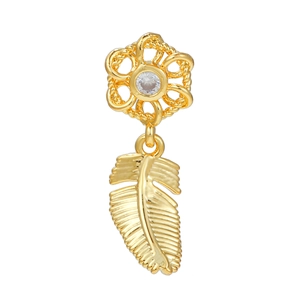Minimalist 18k gold feather earring with a hollow flower and zircon stone detail