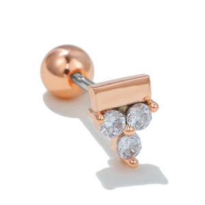 Macro detail of rose gold bear stud earring with sparkling cubic zirconia and ball back